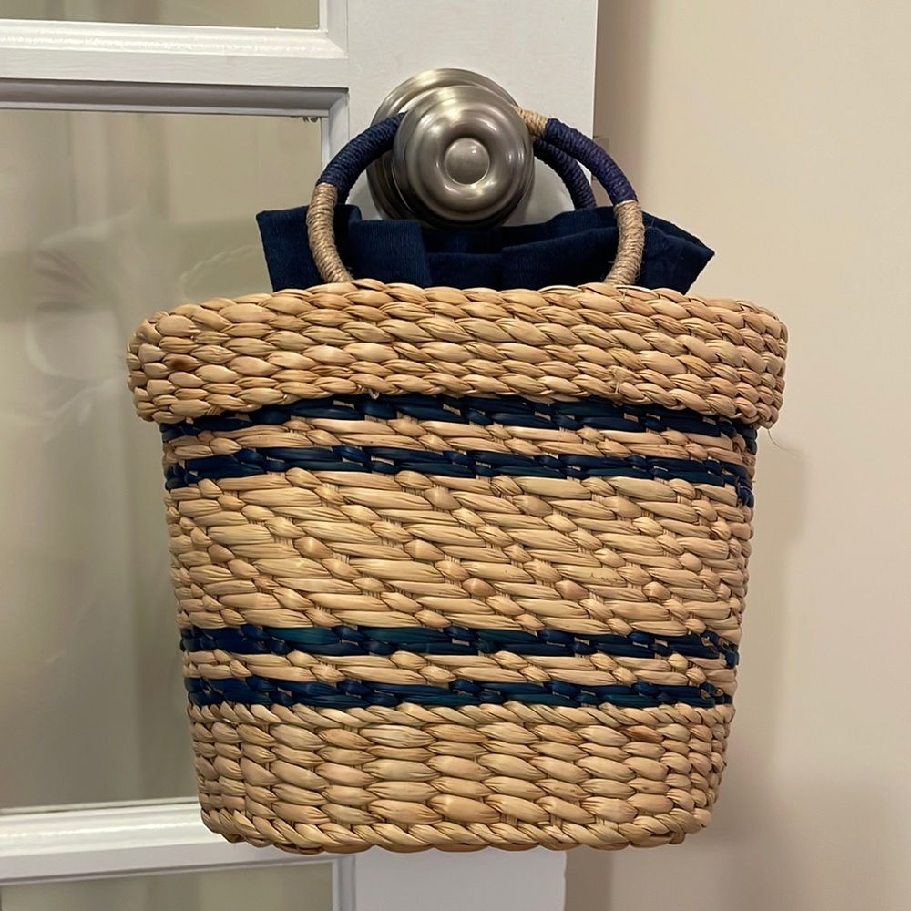 Poolside x JCrew drawstring rattan bag.